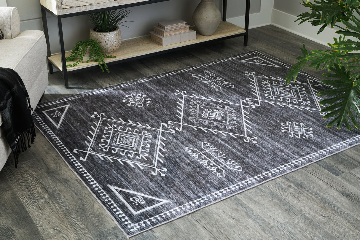 Arloman - 5' x 7' Rug - Black / Cream / Gray